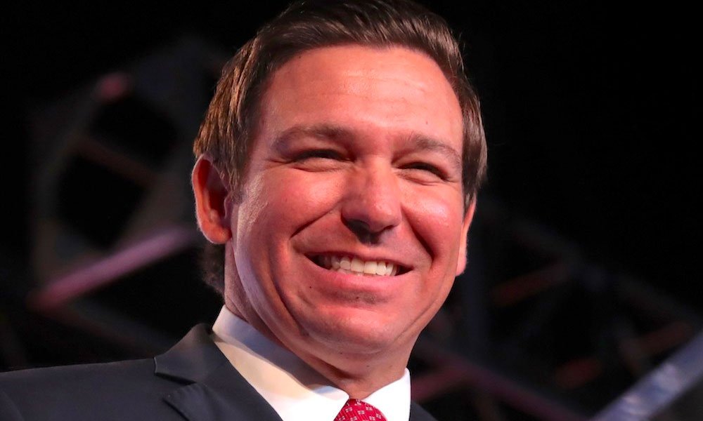 Ron DeSantis laughs