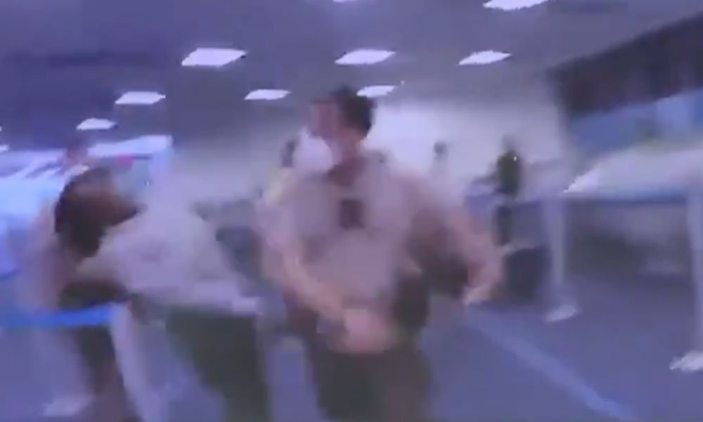 Cop slaps woman