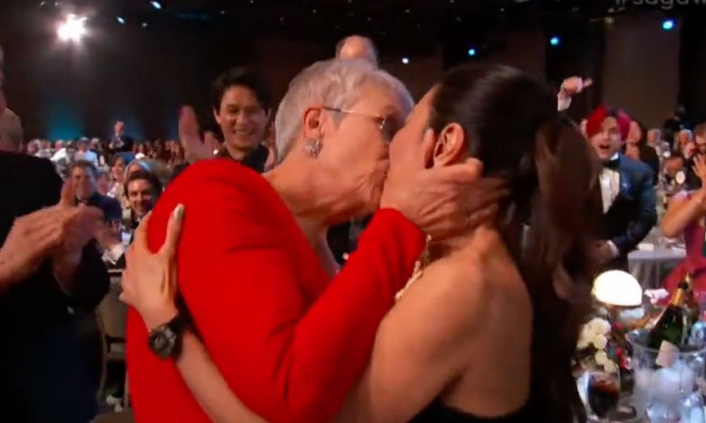 Jamie Lee Curtis kisses Michelle Yeoh