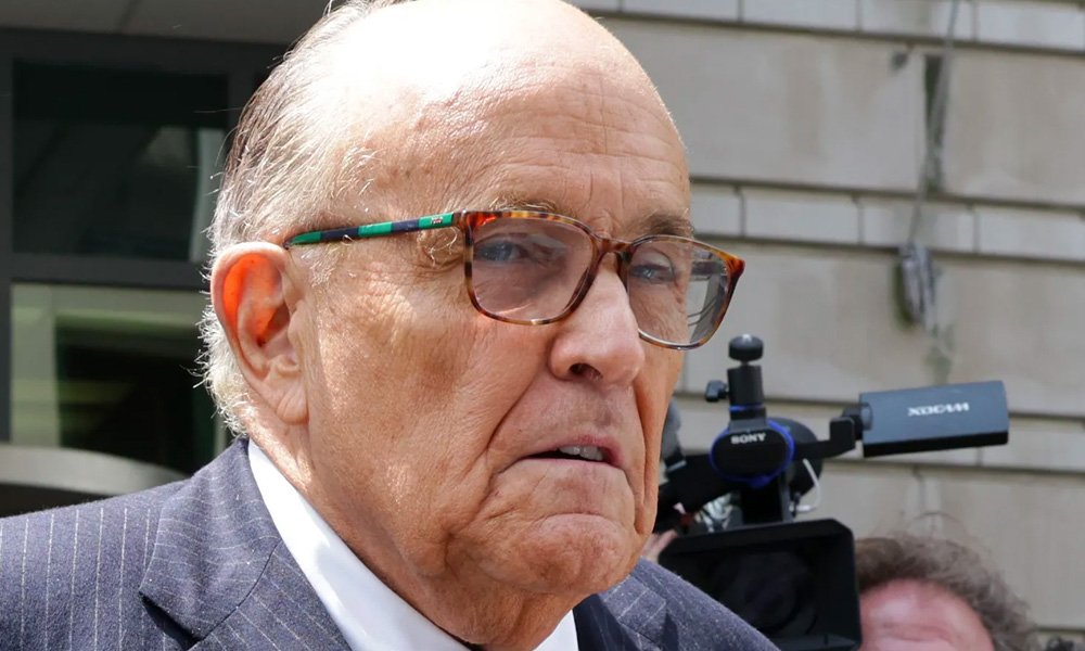 Rudy Giuliani surrenders
