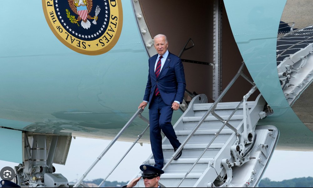 President Joe Biden descends from Air Force One.