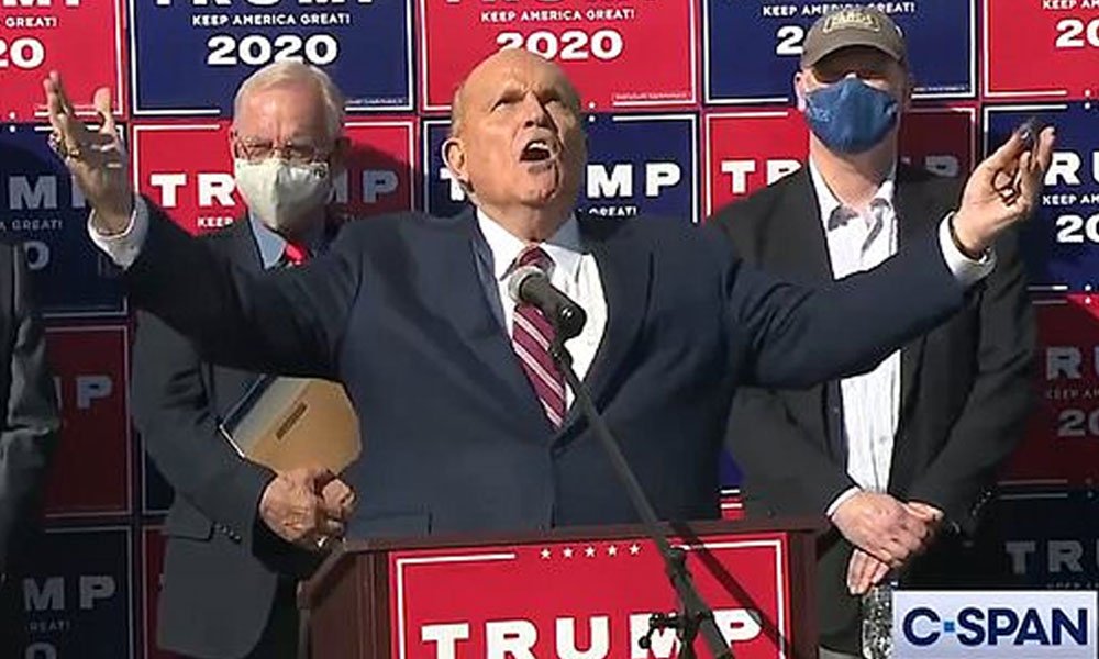 Trump attorney Rudy Giuliani speaks to the media at a press conference held in the back parking lot of Four Seasons Total Landscaping on November 7, 2020 in Philadelphia, Pennsylvania. (Screenshot)