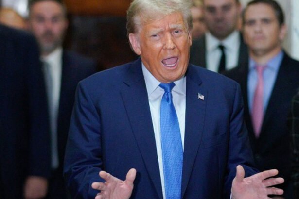 Former President Donald Trump addresses reporters outside a Manhattan courtroom