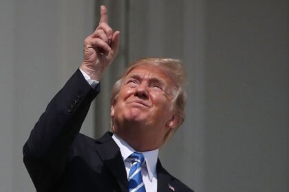 Donald Trump views a solar eclipse at the White House on Aug. 21, 2017.