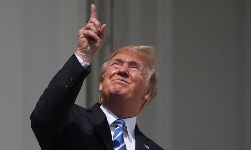 Donald Trump views a solar eclipse at the White House on Aug. 21, 2017.