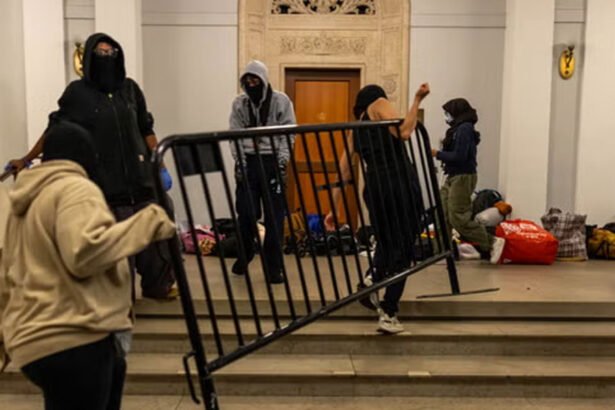 Demonstrators supporting Palestinians in Gaza barricade themselves inside Hamilton Hall