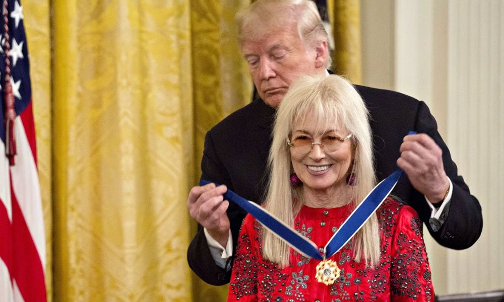 Then-President Donald Trump presents Miriam Adelson, wife of billionaire Sheldon Adelson, with the Presidential Medal of Freedom in the White House on Nov. 16, 2018.