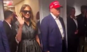 Social Media Buzzes After Trump Appears With 'Melania' Wearing Sunglasses Indoors