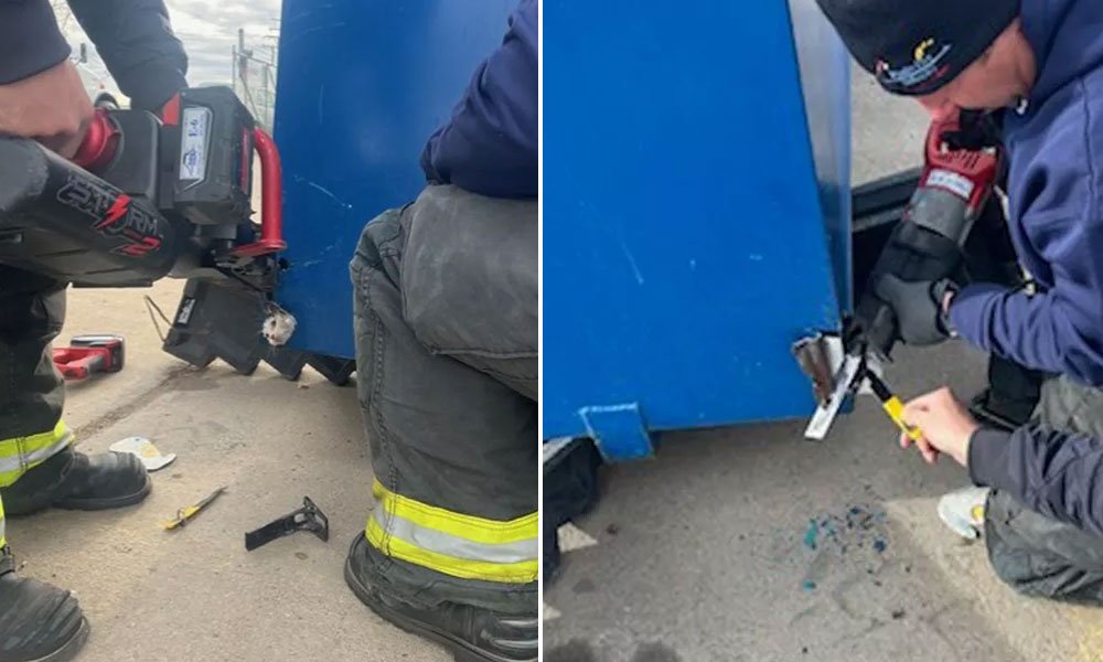 The Poudre Fire Authority rescuing tiny cat from dumpster.