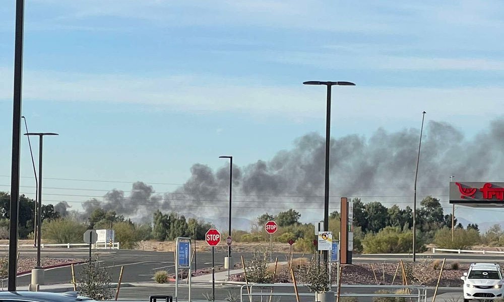 Plumes of smoke billow near Marana Regional Airport in Arizona. (Photo via X)