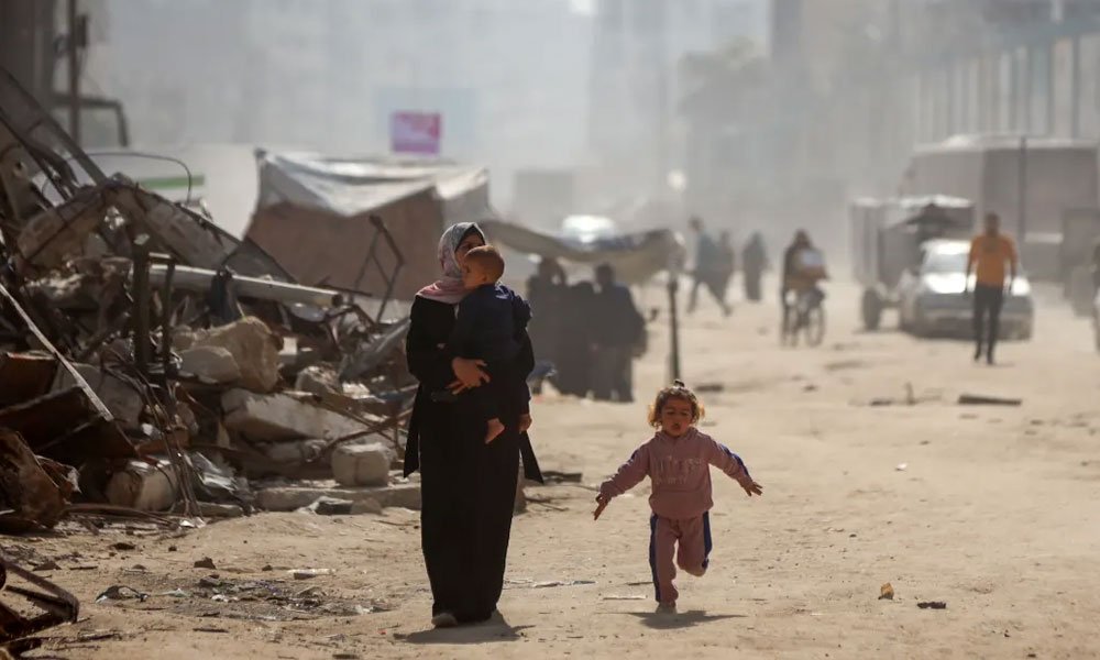 Palestinians struggle to survive their daily lives in makeshift tents among the rubble of buildings destroyed by Israeli attacks in Beit Lahia, Gaza on March 17, 2025. 