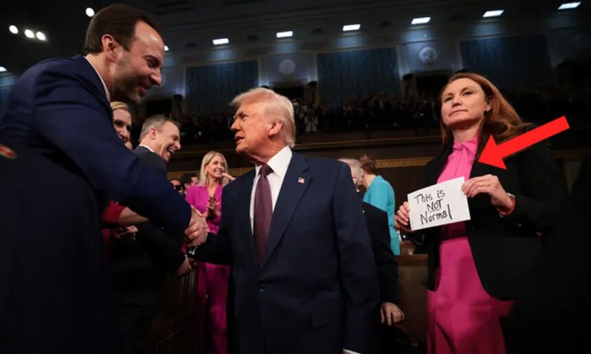 Watch: Texas Republican Forcibly Rips Sign From Democratic Congresswoman Ahead of Trump’s Speech