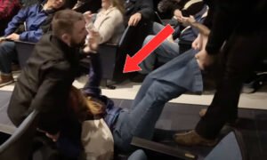 Woman Forcibly Dragged Out of GOP Town Hall by 6 Guards Sues for $5M