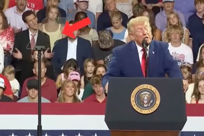 Trump upstaged by man behind him at rally—and the internet can't stop laughing