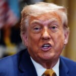 Trump shares video praising his economy—and misses embarrassing news ticker scrolling underneath