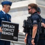 Air Force major who called for Trump’s impeachment is locked in solitary confinement 24/7: Lawyer