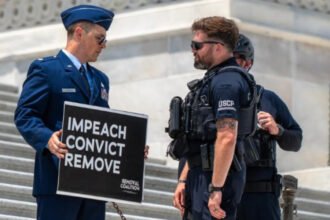 Air Force major who called for Trump’s impeachment is locked in solitary confinement 24/7: Lawyer