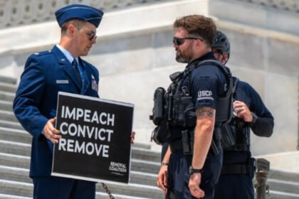 Air Force major who called for Trump’s impeachment is locked in solitary confinement 24/7: Lawyer