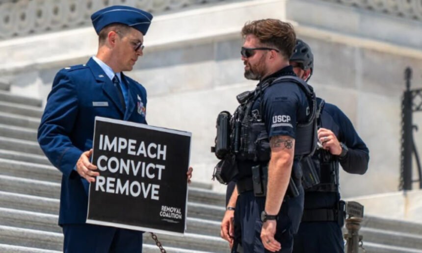 Air Force major who called for Trump’s impeachment is locked in solitary confinement 24/7: Lawyer