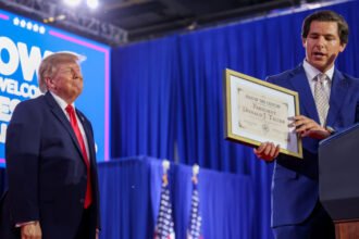 Trump Receives Made-Up ‘Man of the Century Award’ at Iowa Rally